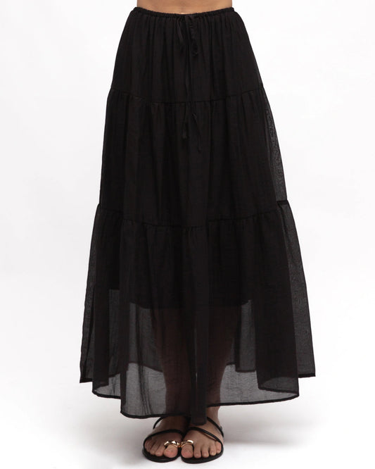 Black tiered skirt on a white background